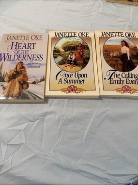 Janette Oke Paperback Book Set - Cream Covers with Purple Text